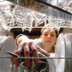 Person reaching into dishwasher to load and unload dishes